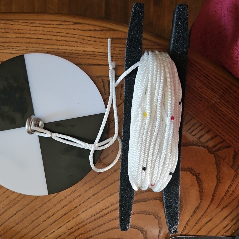 Black and White Buoy with Rope